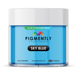 Sky Blue Glow in the Dark Epoxy Powder Pigment in container and applied in epoxy resin projects