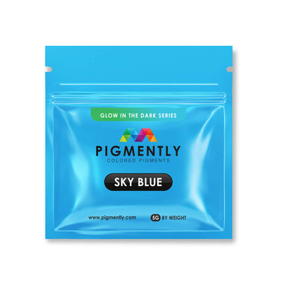 Sky Blue Glow in the Dark Epoxy Powder Pigment in container and applied in epoxy resin projects