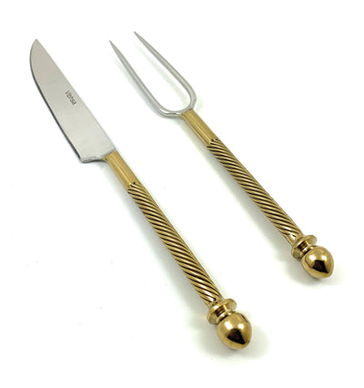 Luxury Carving Set by Vibhsa featuring twisted gold-tone handles with stainless steel blades and fork.
