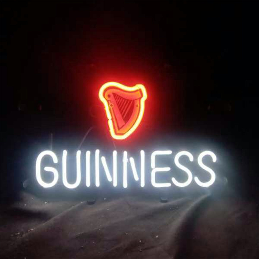 Guinness Lager Beer Neon Signs Light glowing on wall
