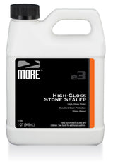 MORE® High-Gloss Stone Sealer quart and gallon containers with product labeling visible