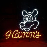 Neon sign featuring a white outlined cartoon bear face above cursive orange neon text reading 'Hamm's' against a dark background.