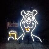 Neon light sign of a smiling bear holding a frothy beer mug, outlined in white and yellow neon tubes against a dark background with a Hamm's Beer logo in the corner.