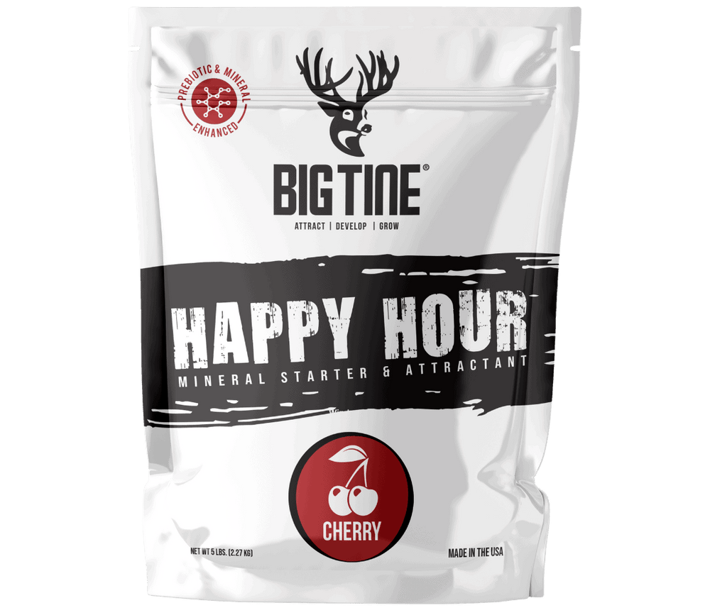 White resealable bag of Big Tine Happy Hour Cherry mineral starter and attractant, featuring a black horizontal stripe and a red cherry icon below the logo.