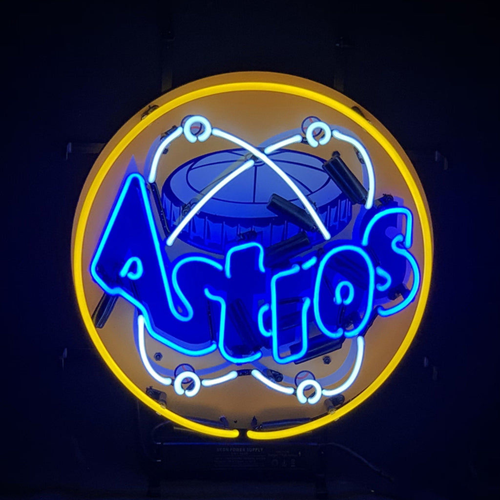Round neon sign with a yellow outer ring, white atomic orbit graphic, and bright blue text spelling Houston Astros