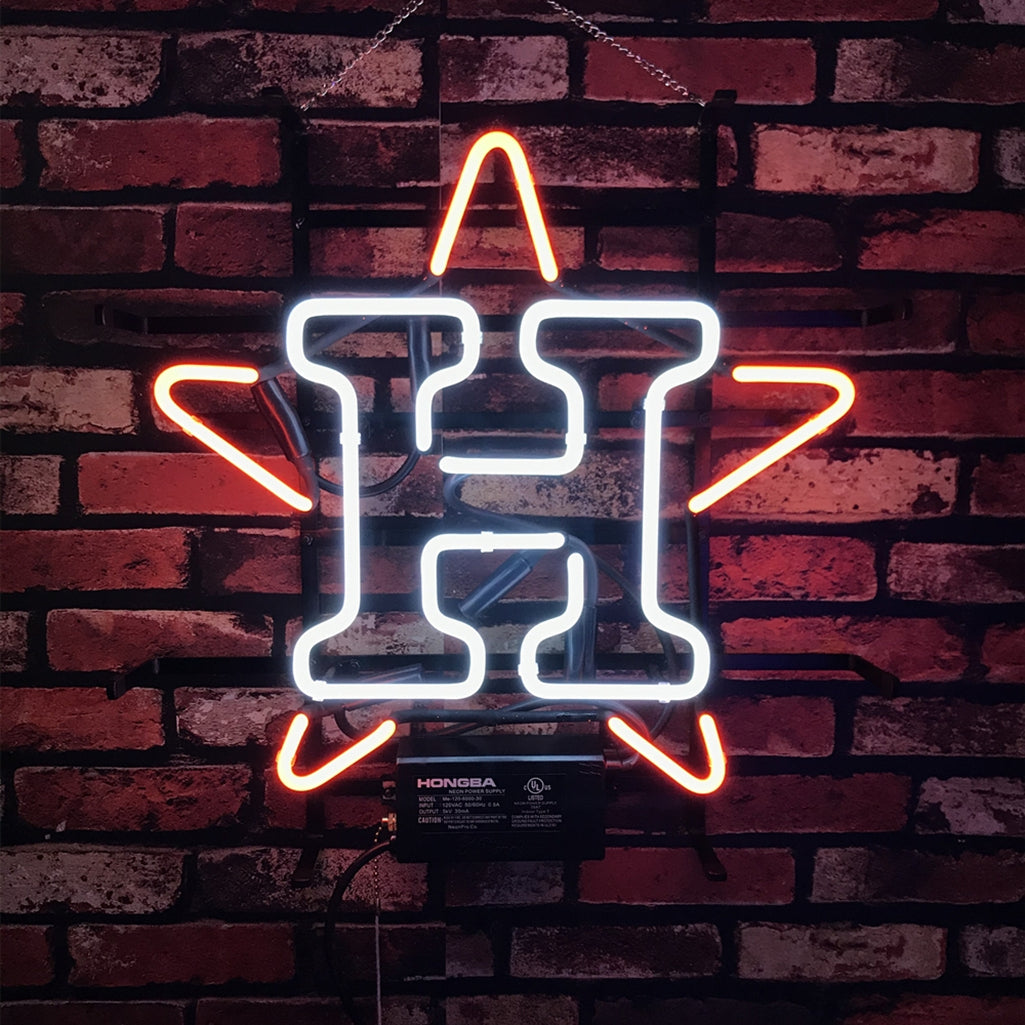 Houston Astros Neon Sign Light glowing with vibrant orange and white neon tubes on a metal grid backing