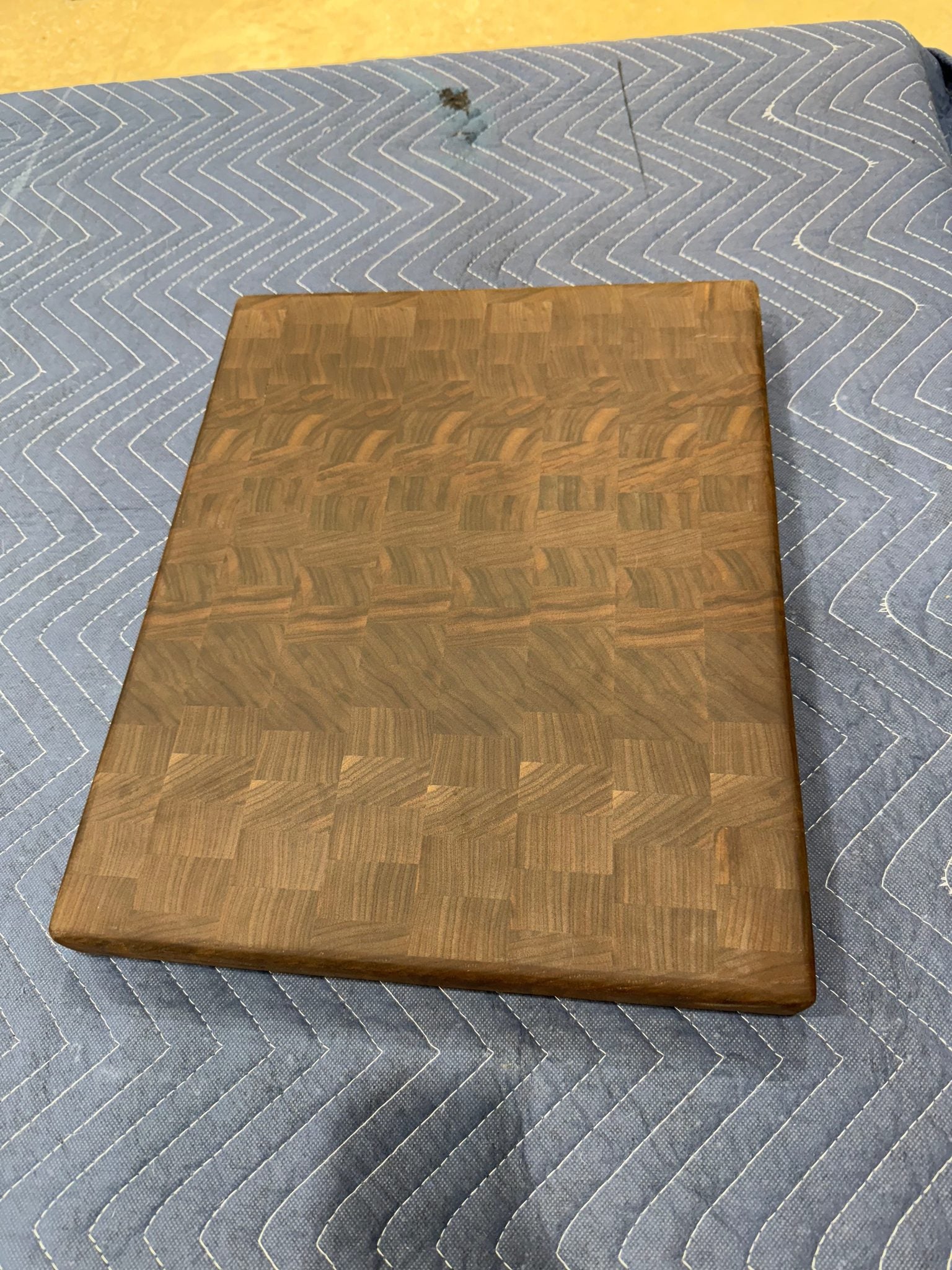 Solid end grain walnut cutting board by Sasquatch Tables LLC