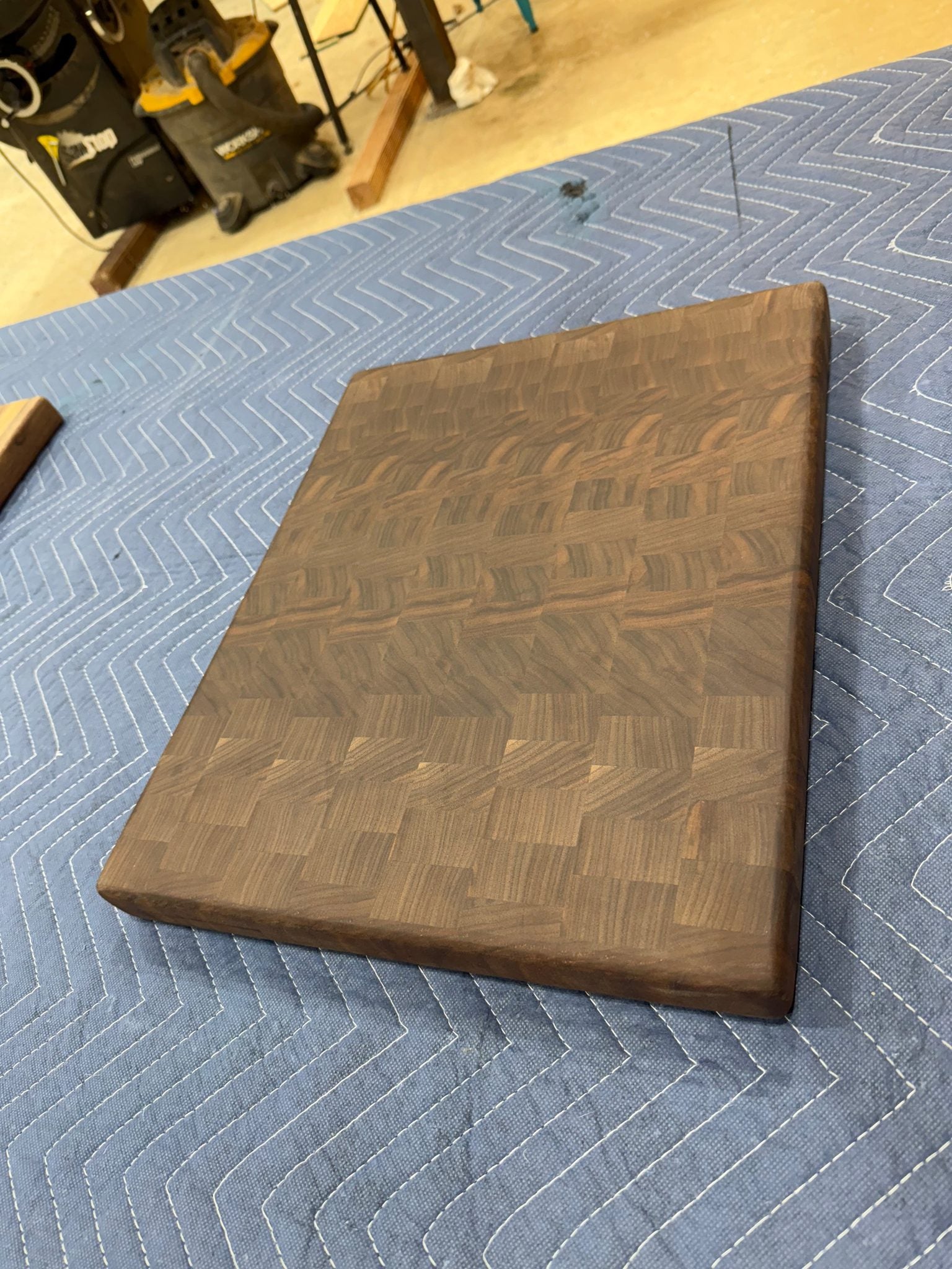 Solid end grain walnut cutting board by Sasquatch Tables LLC