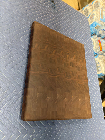 Solid end grain walnut cutting board by Sasquatch Tables LLC