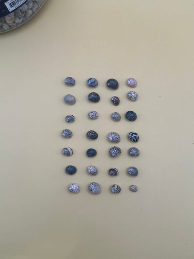 Set of 10 mixed micro Nerita shells in reds, pinks, black, white, and cream colors with unique natural patterns