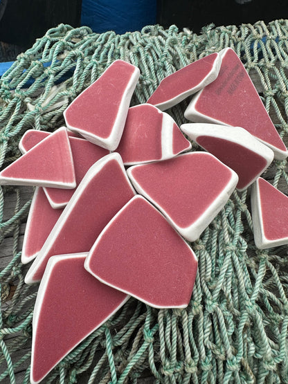 Assorted hand-tumbled pottery pieces in earthy colors for mosaic crafts