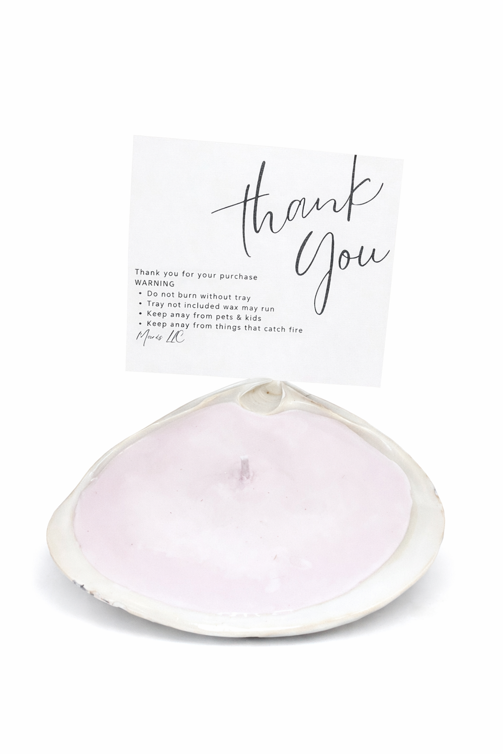 Light pink single wick candle by MARIS LLC