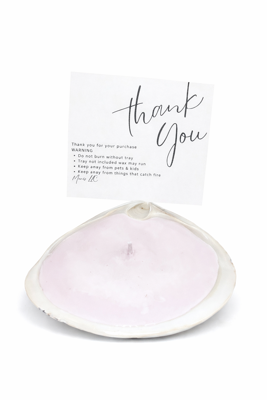 Light pink single wick candle by MARIS LLC
