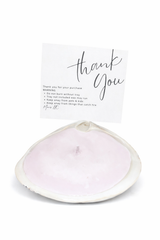 Light pink single wick candle by MARIS LLC