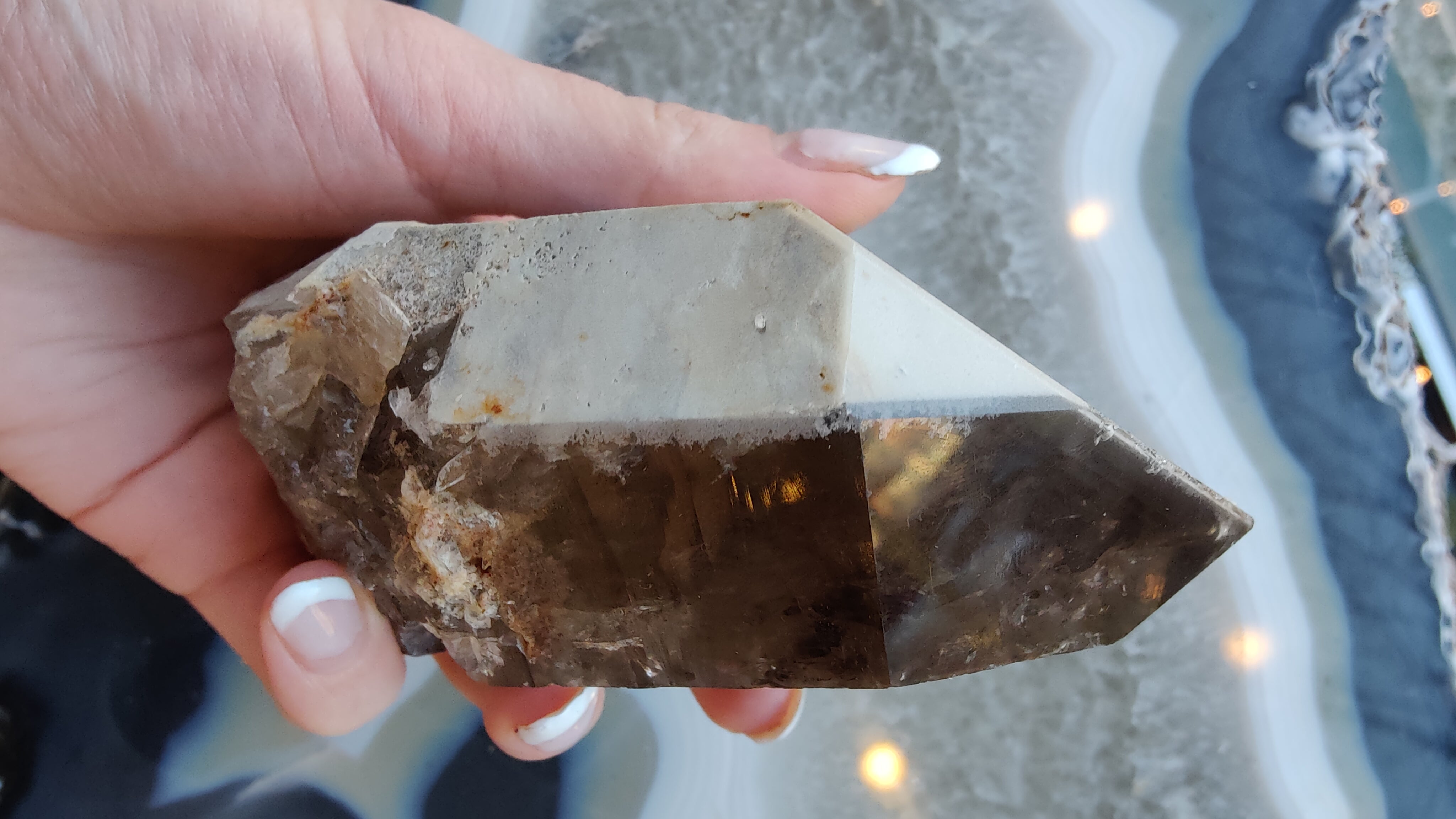 Lodalite Included Smokey Quartz Point showing translucent smokey quartz with lodalite mineral inclusions