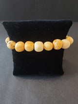 Palo Santo Wood Beaded Bracelet showing round 8mm beads on a wrist