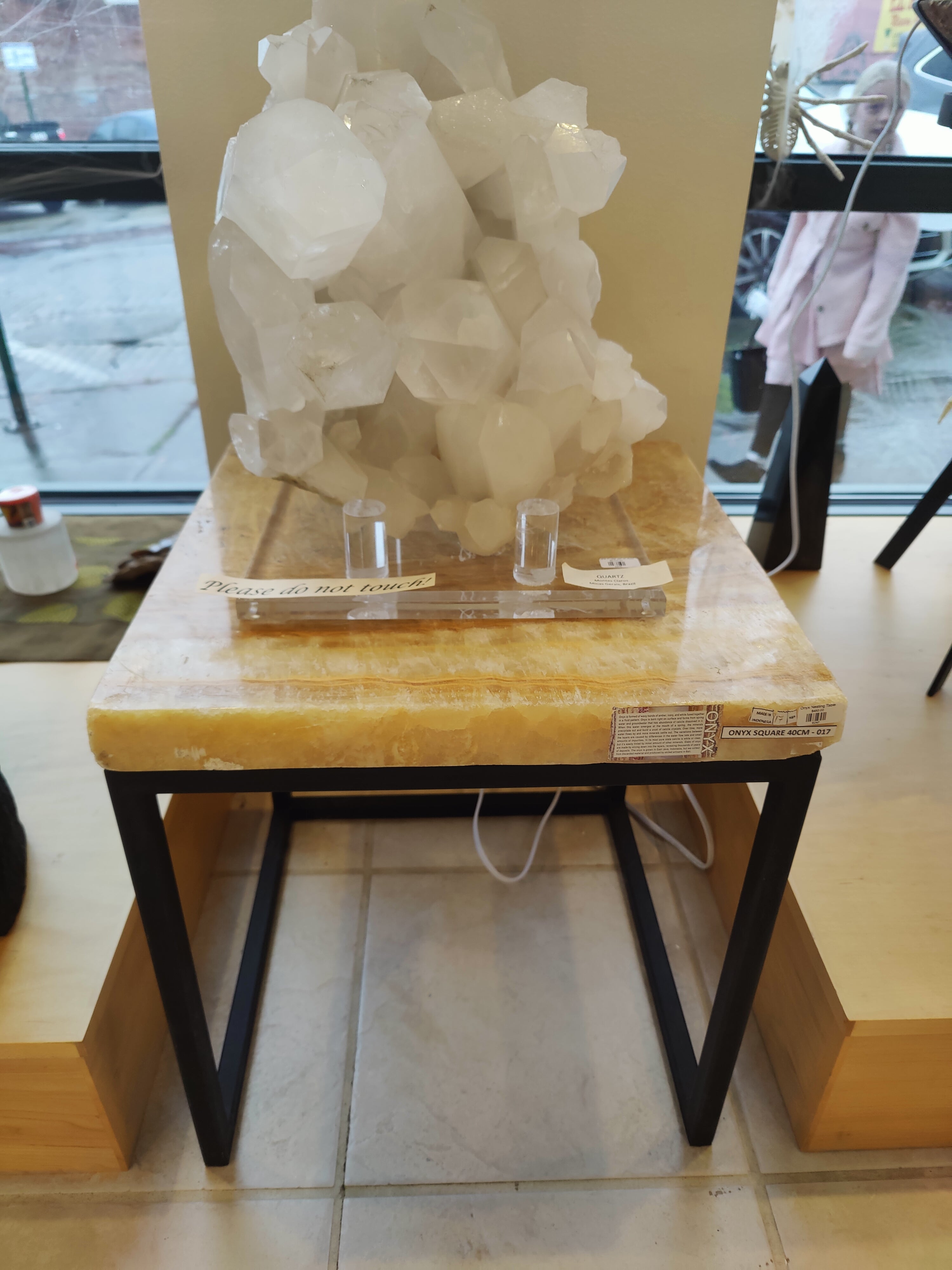 Onyx Nesting Table with natural hues and solid square form
