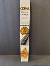 Tall white rectangular box of Copal Maya incense sticks with gold and black text, featuring a circular Mayan art emblem and a stepped pyramid image below it.