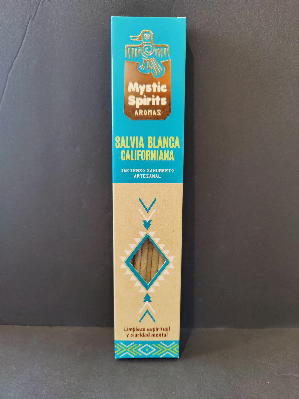 Tall rectangular box of Mystic Spirits Aromas White Sage Californian artisan incense with turquoise, beige, and brown geometric design and cut-out diamond window showing incense sticks inside.