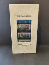 Beige textured box labeled 'Tibetan Incense' showing three colorful incense packets inside with botanical illustrations and text.