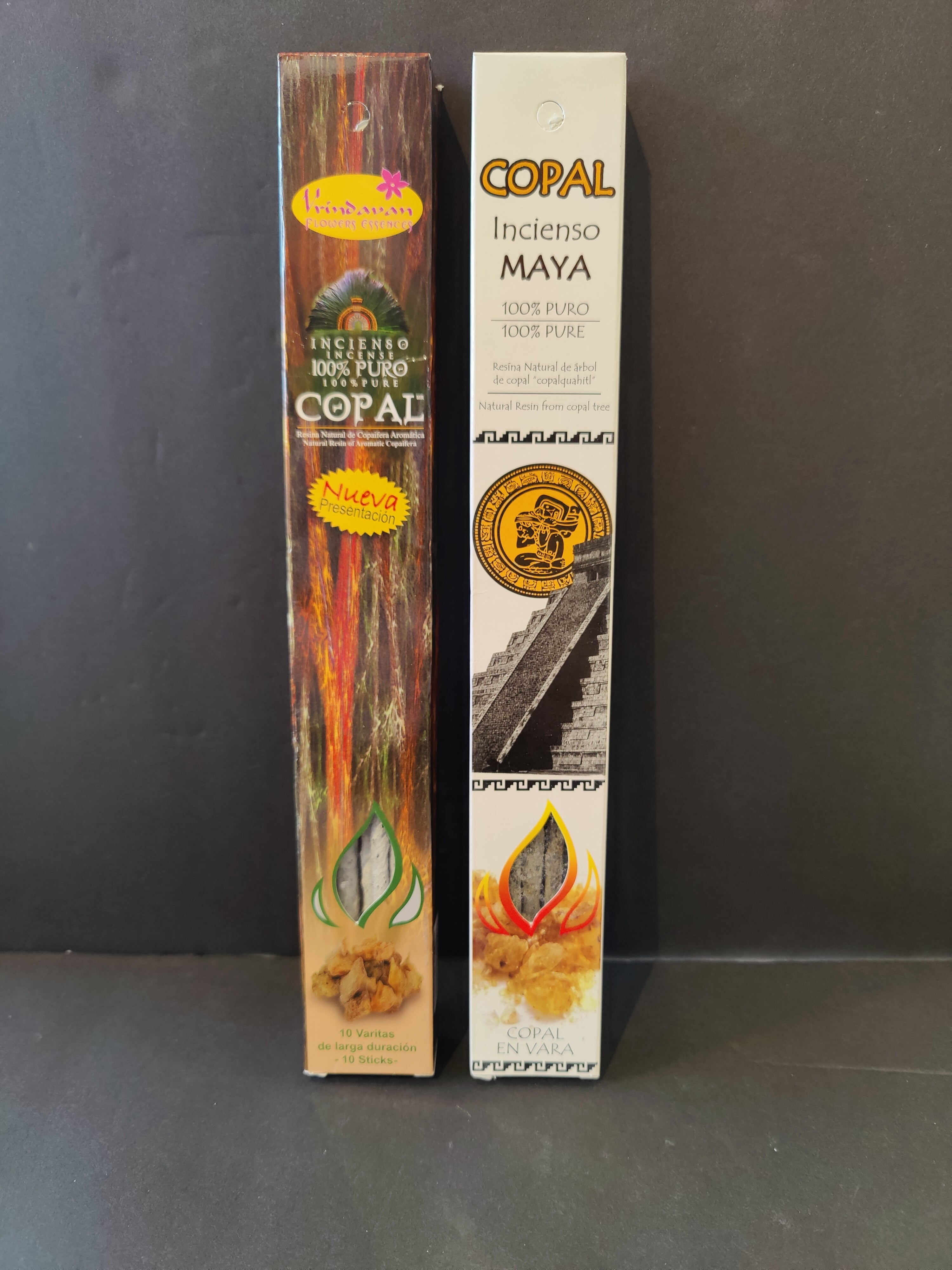 Copal Amber resin incense sticks in natural packaging, shown on wooden surface