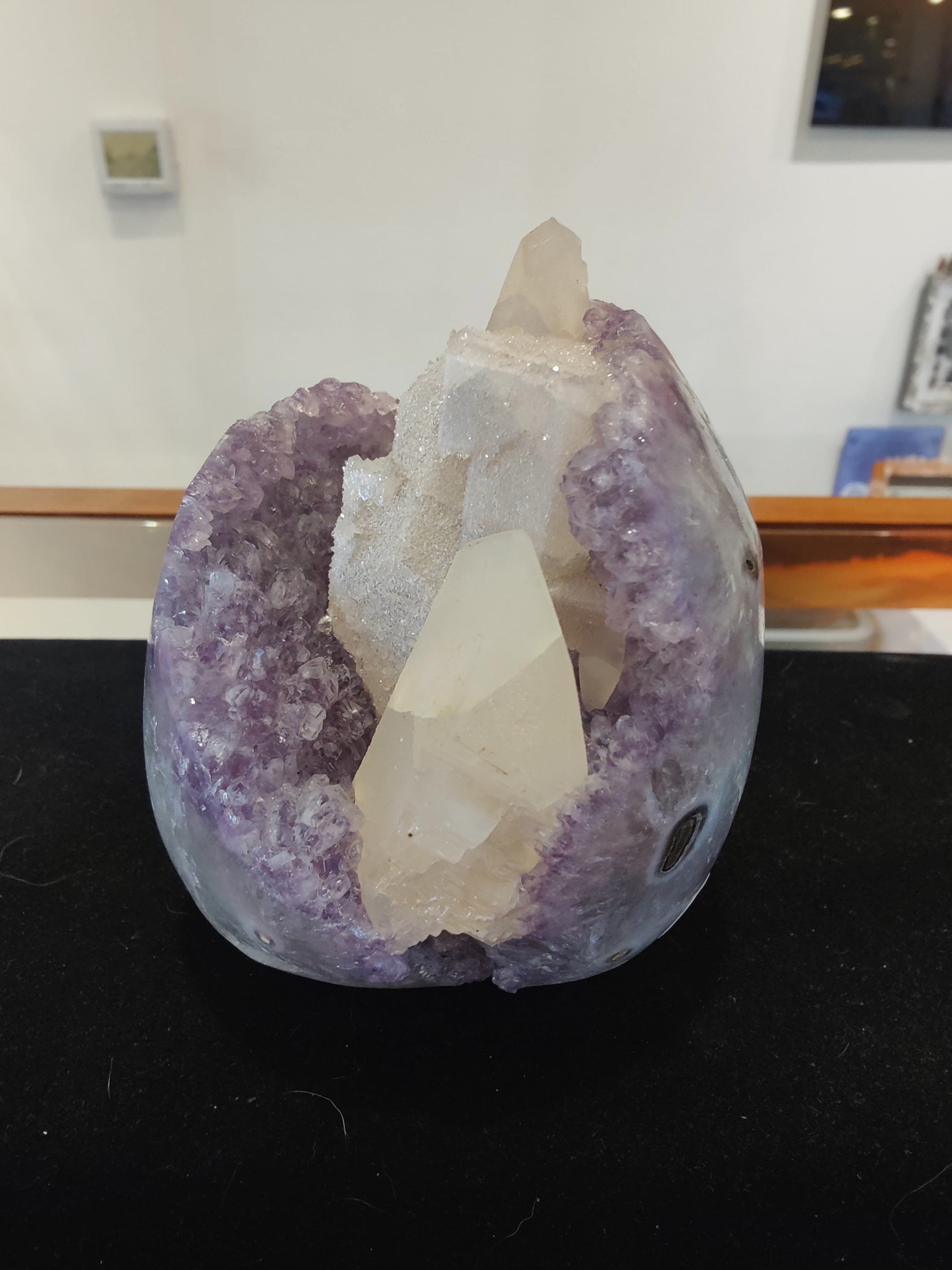 Amethyst with Calcite Crystal Inclusions Geode Sculpture showing purple and white crystal formations