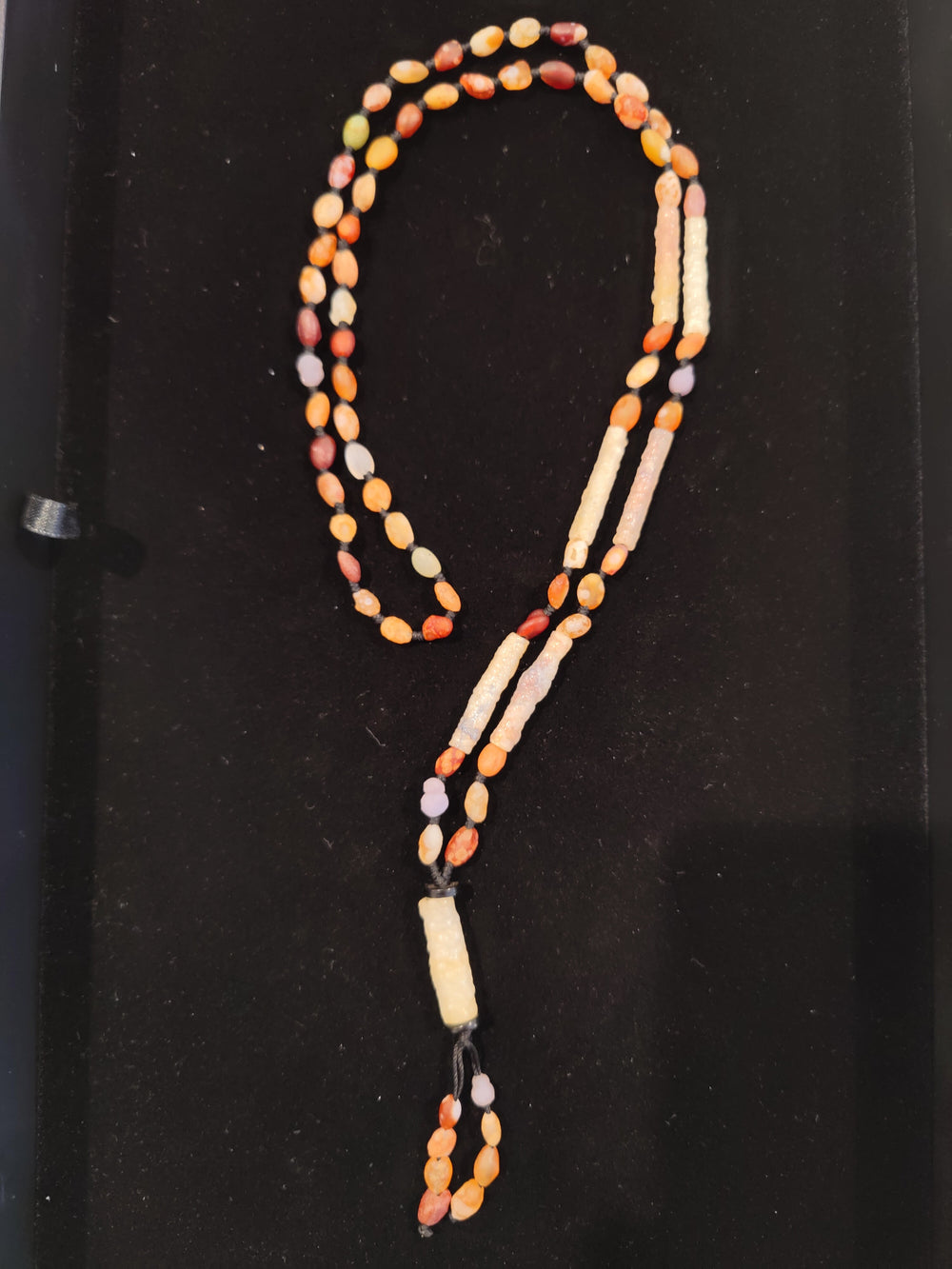 Gobi Desert Candy Agate, Grape Agate and Tube Agate necklace featuring a Tube Agate pendant on a white background