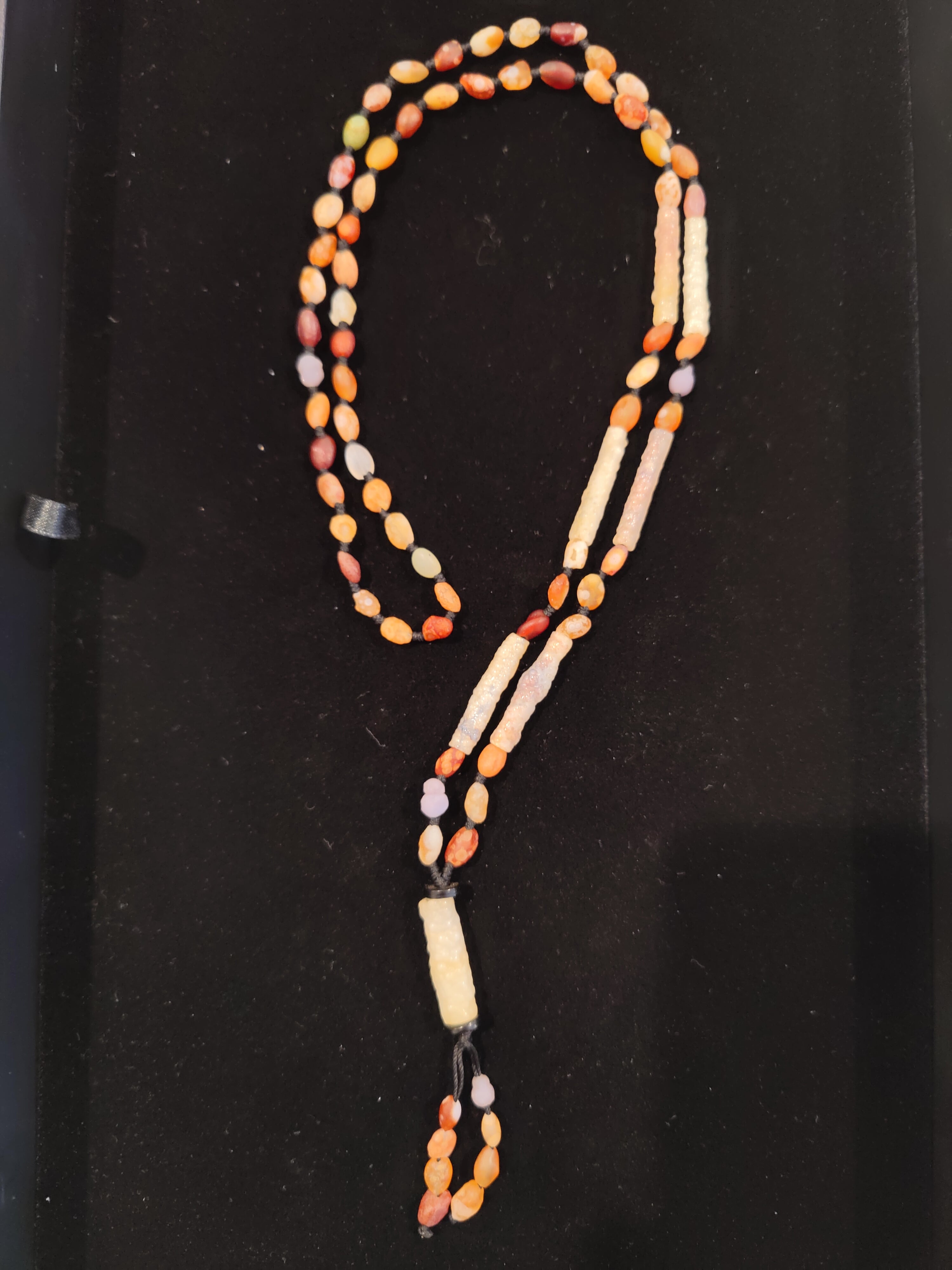 Gobi Desert Candy Agate, Grape Agate and Tube Agate necklace featuring a Tube Agate pendant on a white background