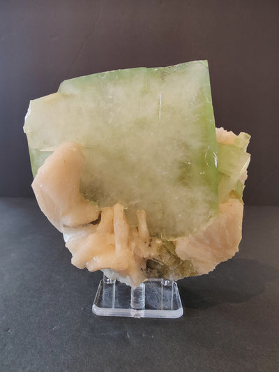 Large green Apophyllite cube with peach Stilbite on matrix from Nashik, India