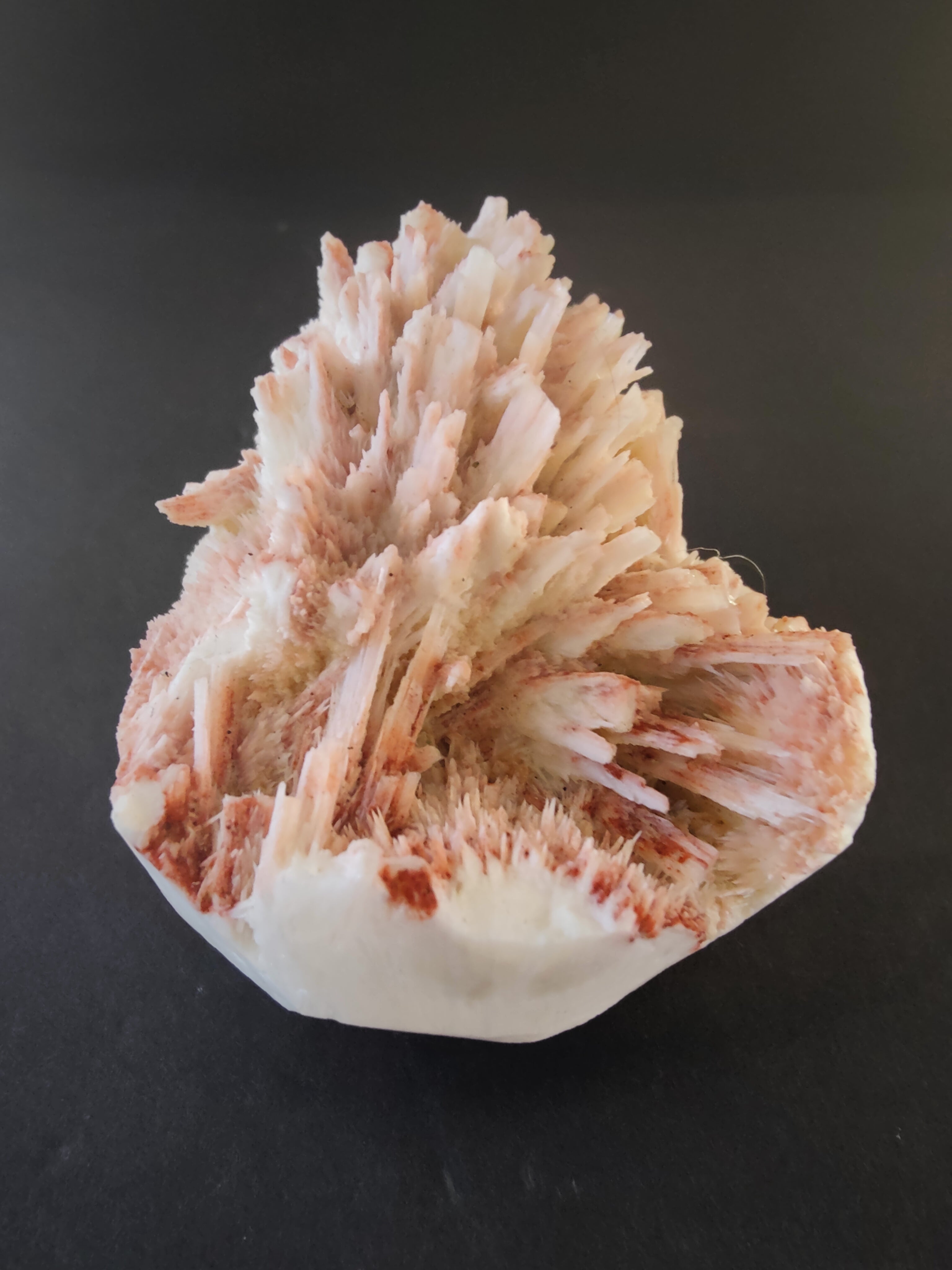 Red Mordenite with Stilbite specimen displaying red and cream crystals on natural matrix