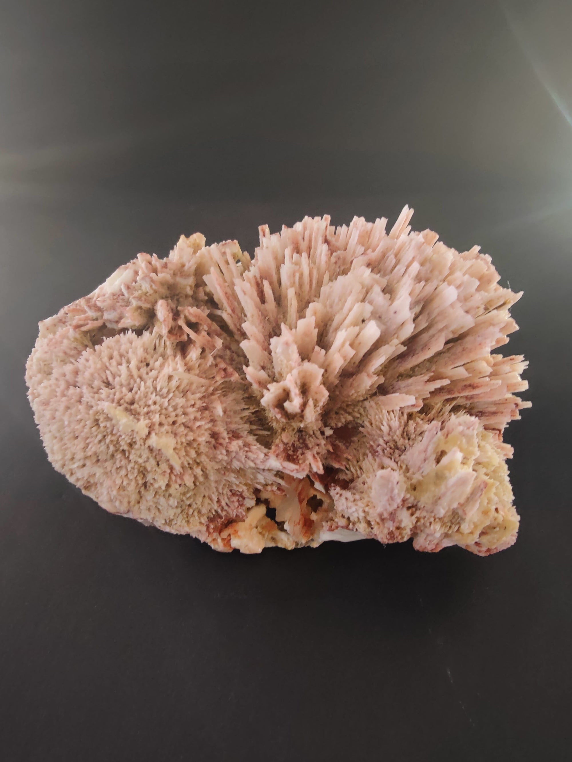 Red Mordenite Specimen featuring deep red crystals on matrix rock