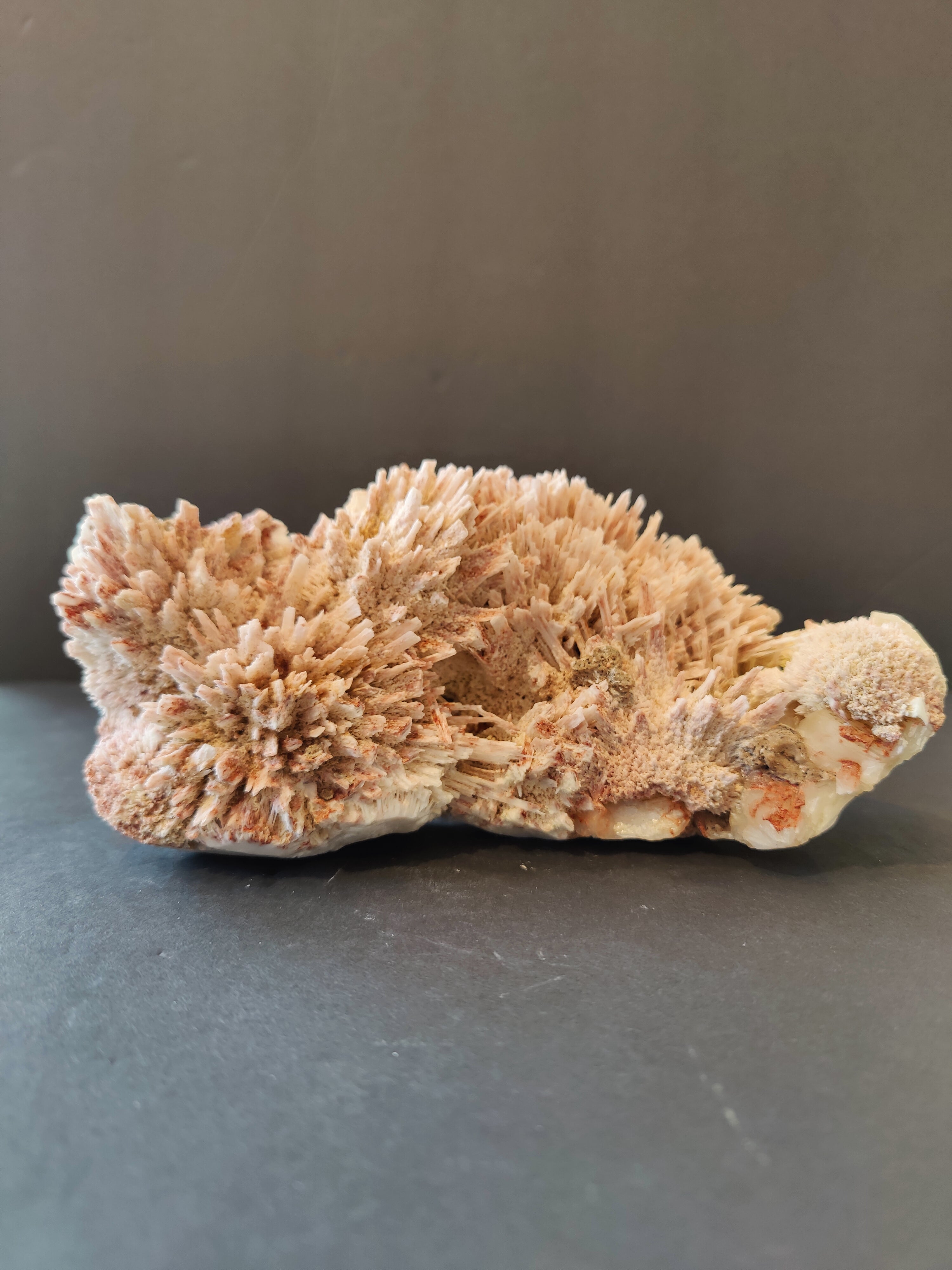 Red Mordenite with Stilbite mineral specimen revealing red and cream crystals on matrix