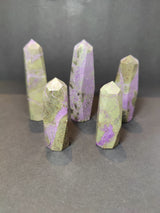 Polished Atlantisite (Stichtite with Serpentine) tower sculpture showing purple and green tones