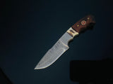 Damascus steel fixed blade hunting knife with patterned blade and handle featuring walnut wood and stag horn accents, including decorative mosaic pins.