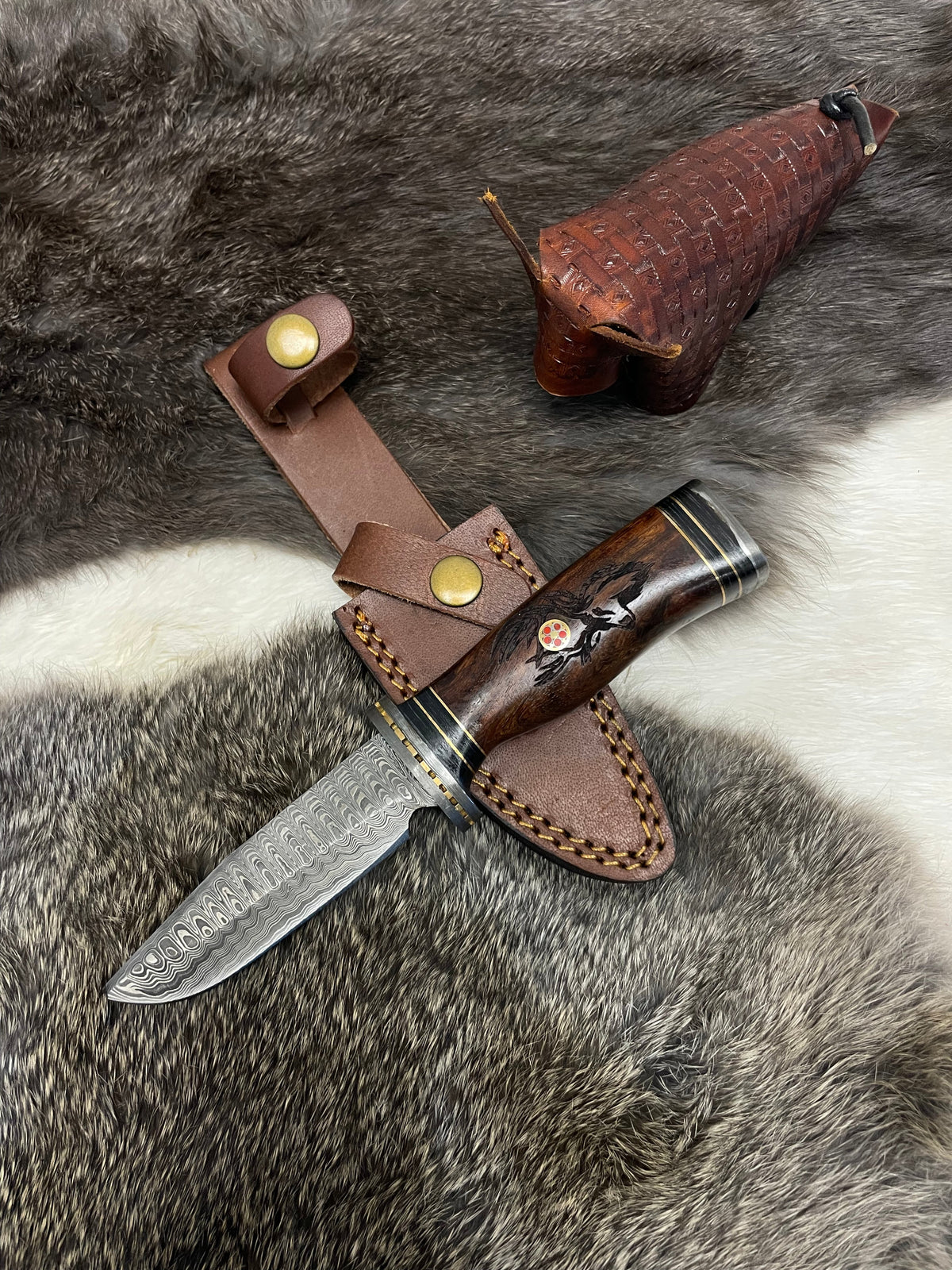 Eldertree Hunter's Knife TK-097 (Compact) showing black walnut handle with deer engraving and Damascus steel blade.