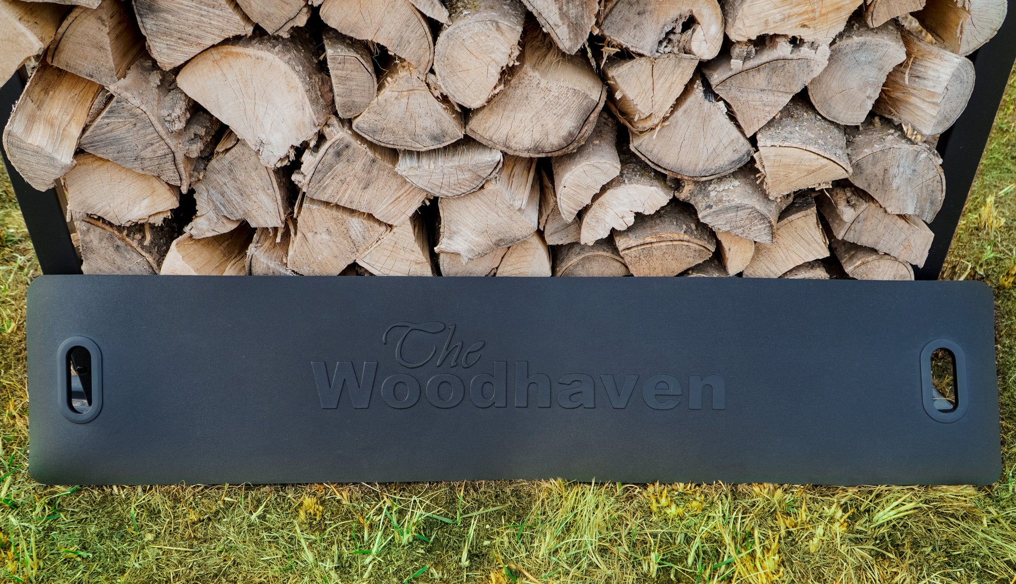 Woodhaven Firewood Log Carrier made of waterproof Vyram with foldable handles