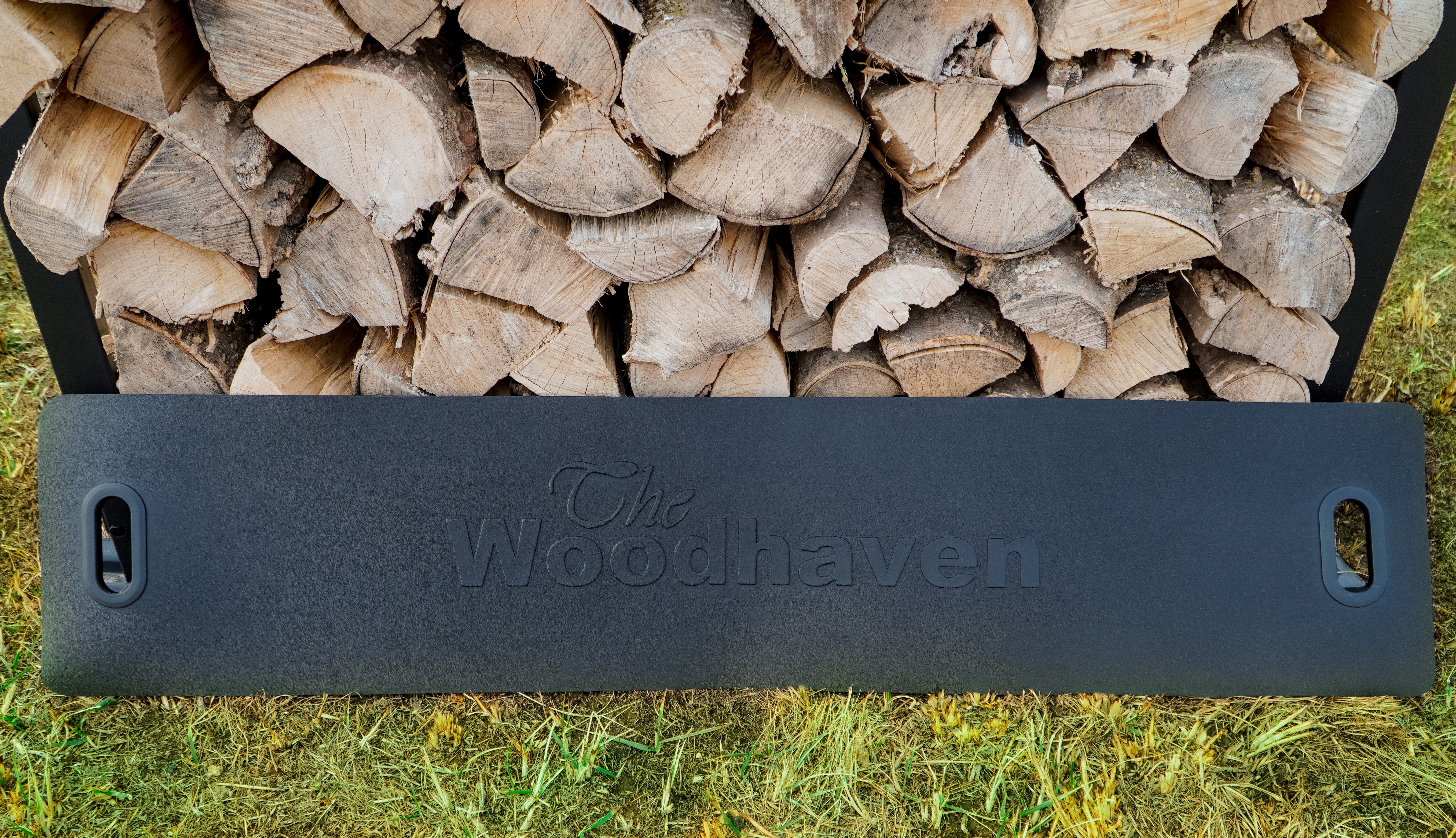 Woodhaven Firewood Log Carrier made of waterproof Vyram with foldable handles