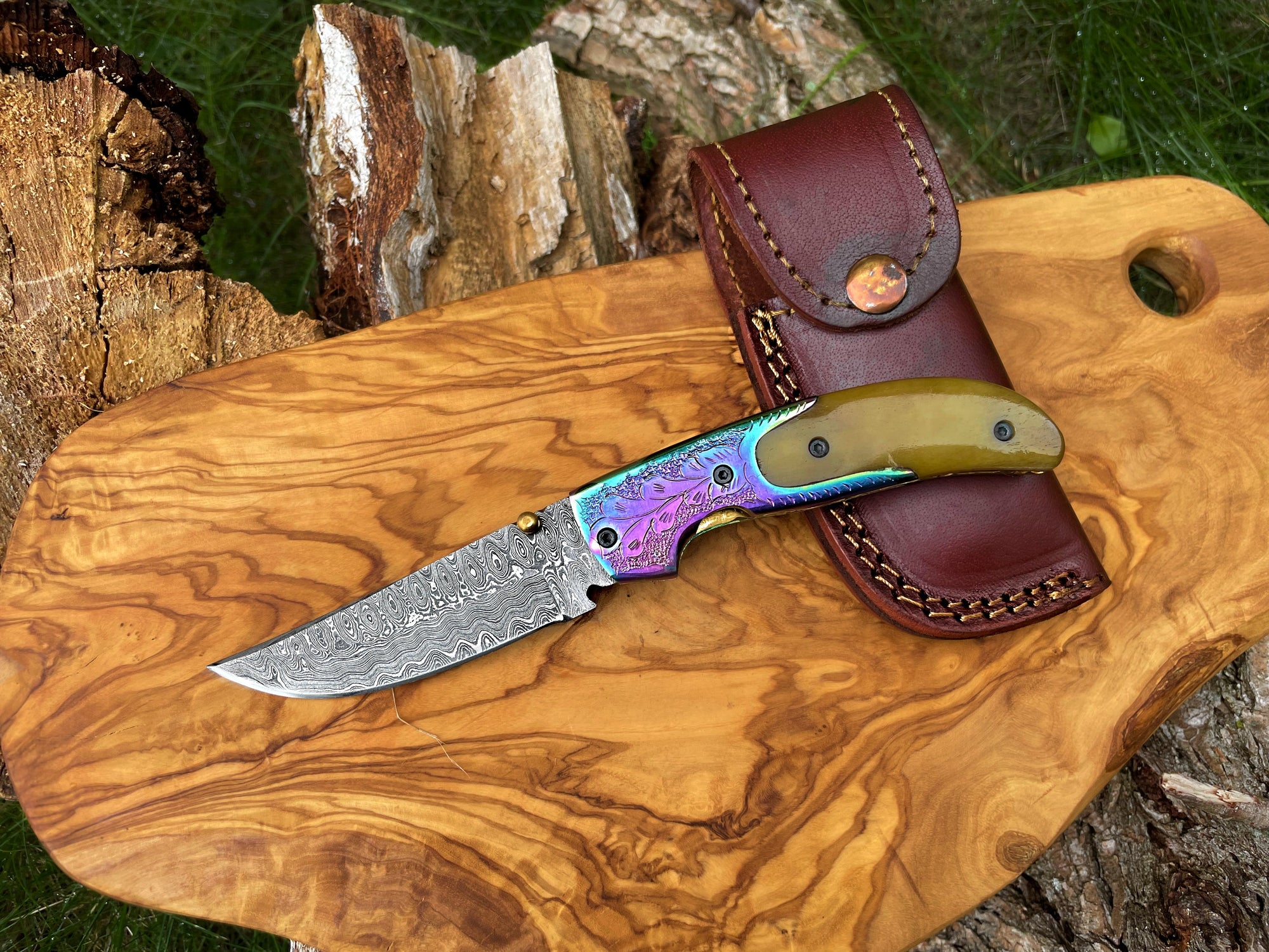 Damasucs Pocket Knife with dyed bone handle and Damascus steel blade folded and open views