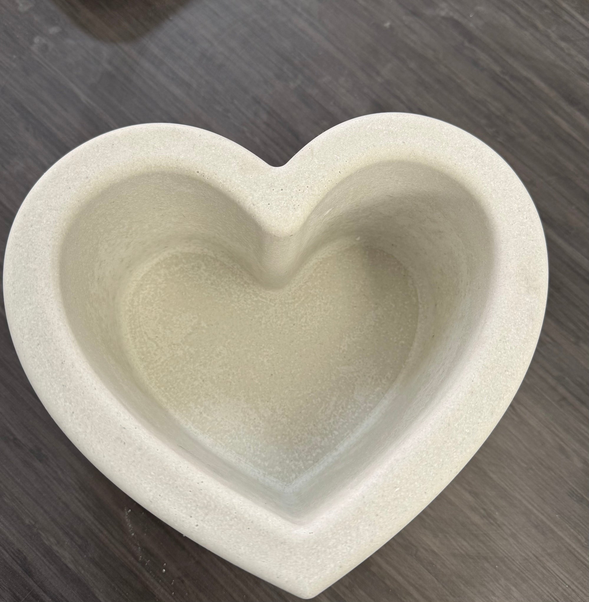 Handcrafted heart shaped concrete candle vessel by Syby Designs LLC
