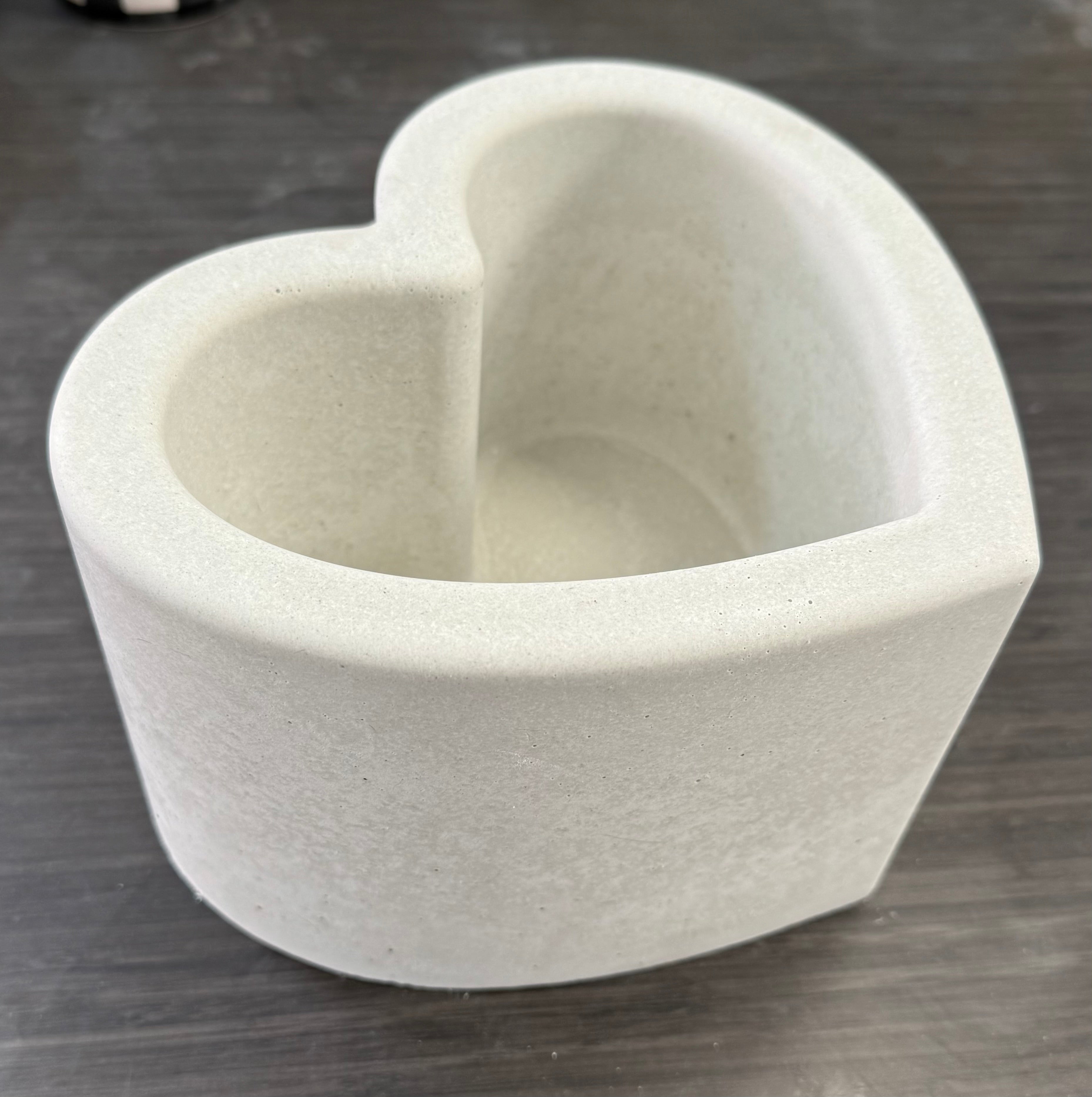 Handcrafted heart shaped concrete candle vessel by Syby Designs LLC