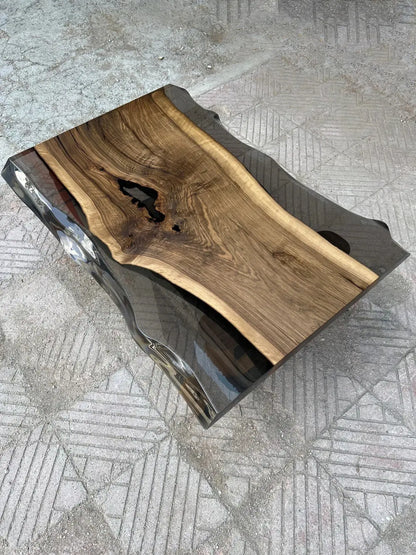 Epoxy live edge coffee table with natural walnut wood and wooden U-shaped legs