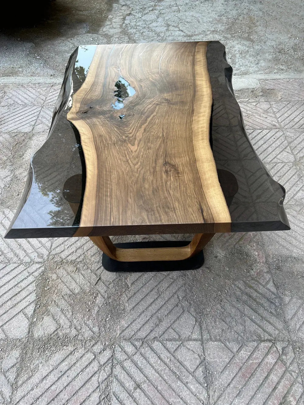 Epoxy live edge coffee table with natural walnut wood and wooden U-shaped legs