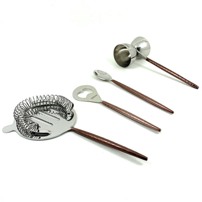 Vibhsa copper hammered bartending kit set of 4 with flat opener, jigger, stirring spoon, and martini shaker on neutral background