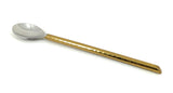 Long bar spoon with a hammered gold-toned handle and a polished silver-toned round spoon bowl, shown against a white background.