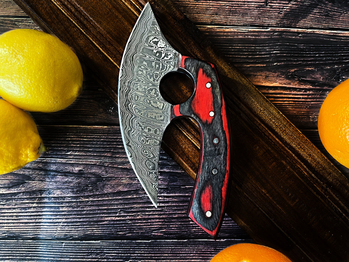 Custom Alaskan Ulu style blade knife with red and black diamond wood handle and leather sheath
