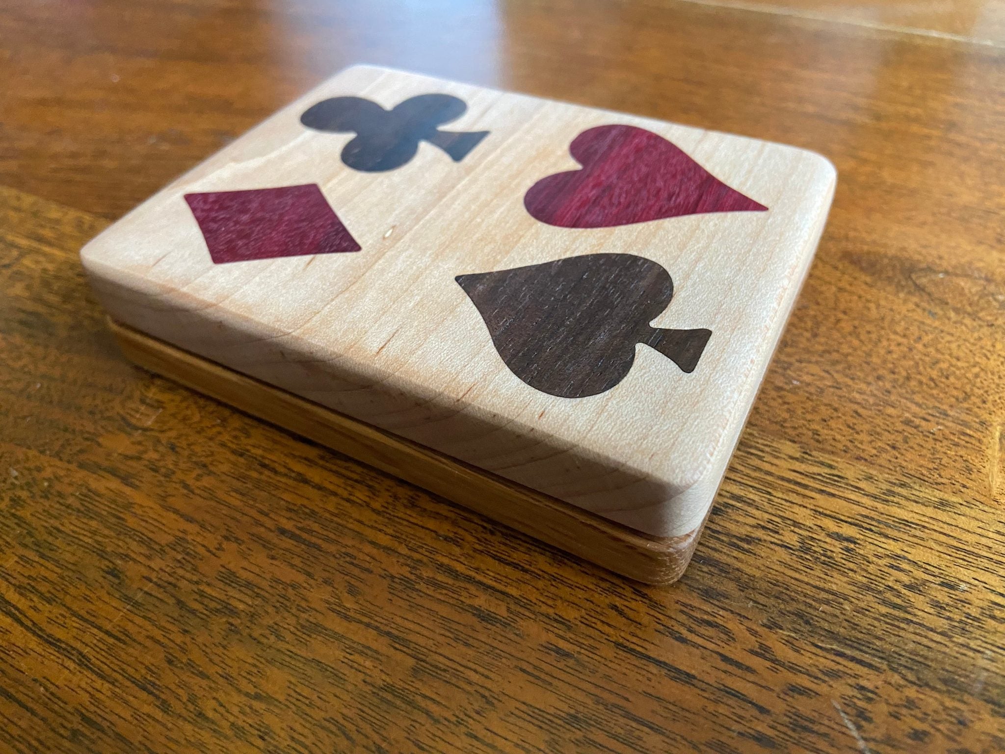 Handcrafted wooden playing card box with wood inlay detail