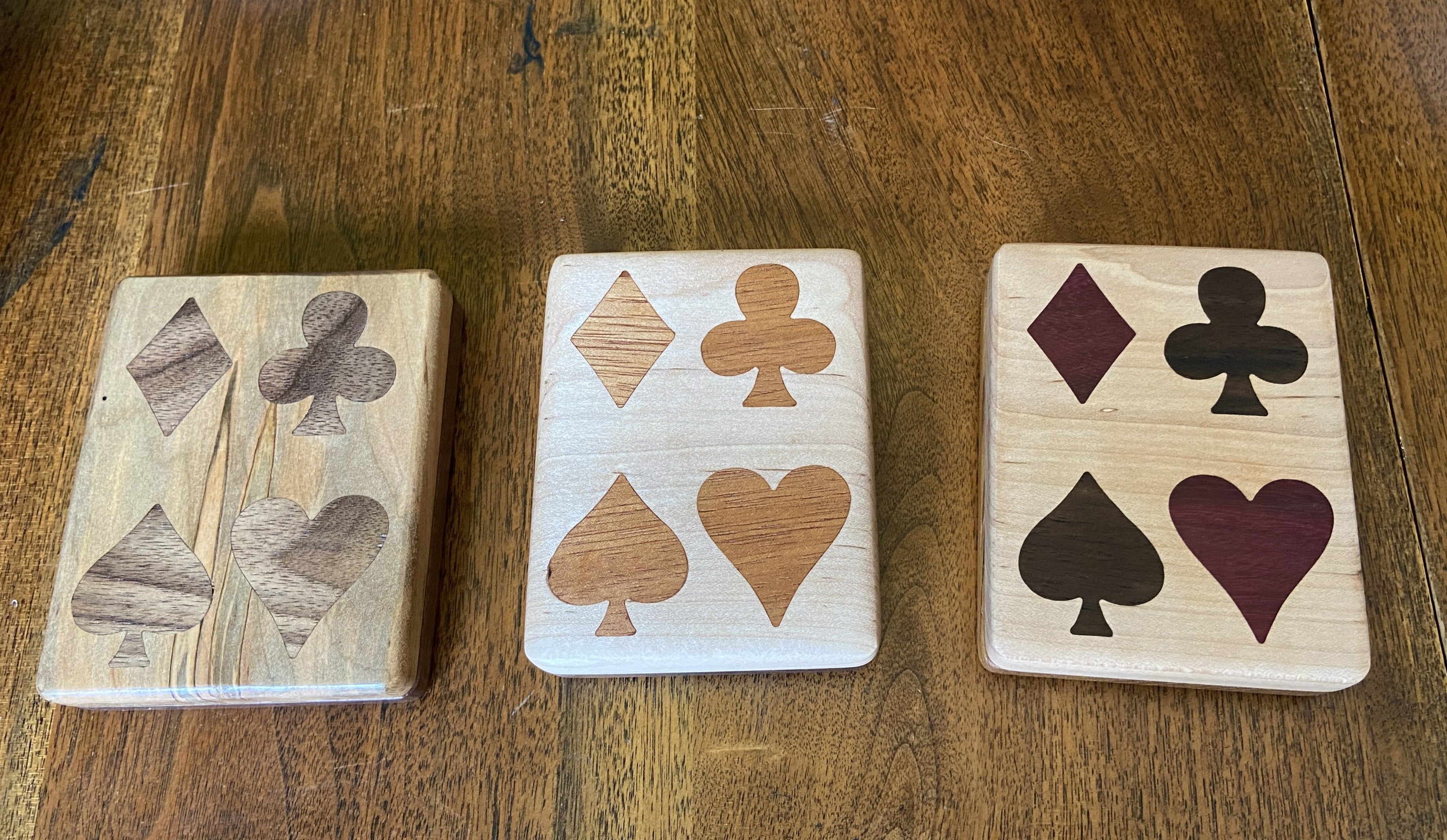 Handcrafted wooden playing card box with wood inlay detail