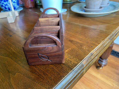 Hand-made walnut tea caddy with custom tea leaf engraving on each end