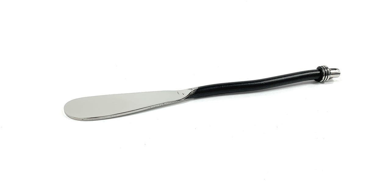 Single black-handled butter spreader with a flat, rounded silver blade and a decorative silver end cap on the handle, shown on a white background.