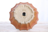 Bottom view of a 10-inch Willow Bonsai ceramic pot with a scalloped edge and a central drainage hole, featuring a warm sandy and orange-brown finish.